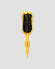 Spazzola per capelli ricci e ondulati per definire i colpi di scena